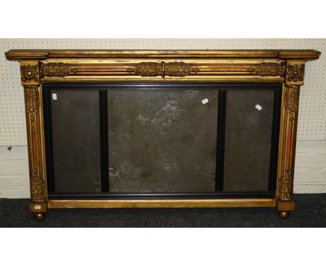 A 19th century giltwood and gesso overmantle mirror, the tied reed frame enclosing an ebonised slip and three plain plates. 7