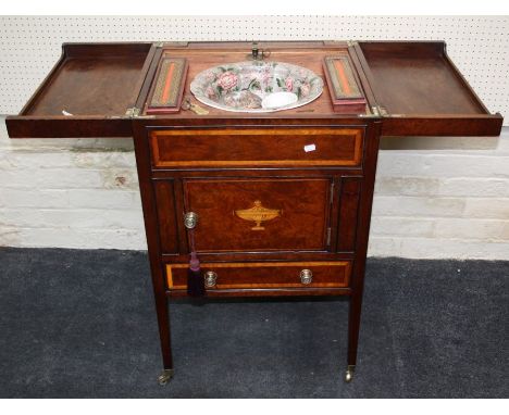 A 19th century mahogany, satinwood crossbanded washstand, the double hinged top with rising mirror fitted interior over cupbo