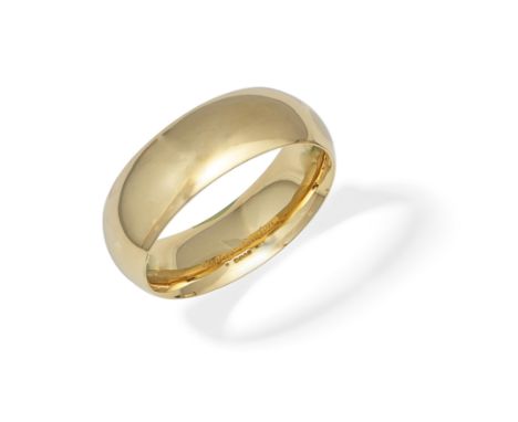 CARTIER: GOLD BANGLE, 1972The polished 18 carat gold hoop, signed Cartier London, maker's mark JC, London hallmark, inner cir