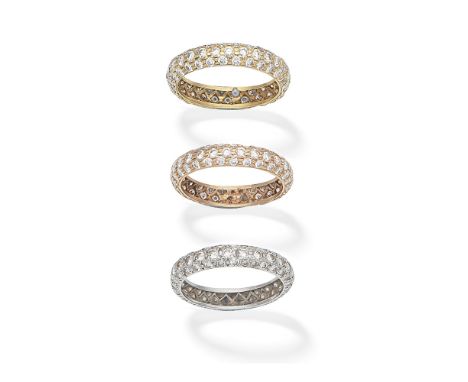 THREE DIAMOND ETERNITY RINGSThe tricoloured bands each set with brilliant-cut diamonds, diamonds approx. 3.10cts total, ring 