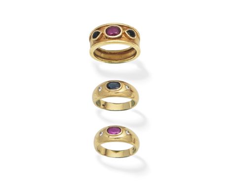 THREE GEM-SET RINGS1st: The oval-cut ruby between pear-shaped sapphires, 2nd: Two rings, each set with an oval-cut ruby or si