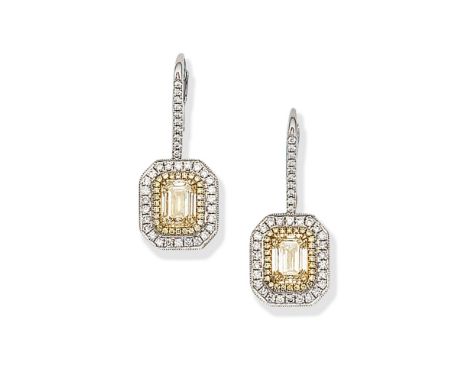 COLOURED DIAMOND AND DIAMOND PENDENT EARRINGSEach step-cut diamond of yellow tint, weighing 1.00 carat or 1.04 carats within 