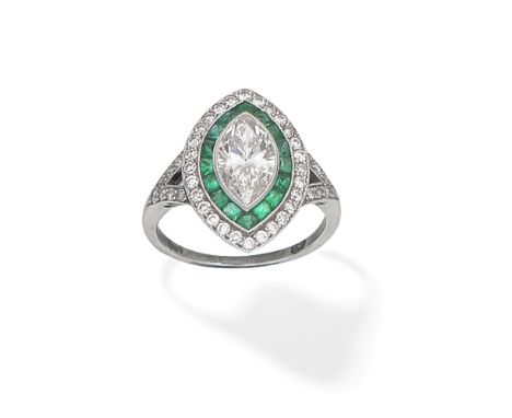 DIAMOND AND EMERALD RINGThe marquise-cut diamond within a double surround of calibré-cut emeralds and old brilliant-cut diamo