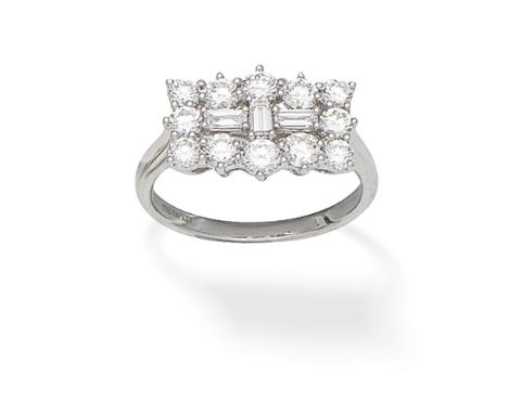 DIAMOND DRESS RINGThe rectangular openwork plaque set throughout with brilliant and baguette-cut diamonds, mounted in platinu