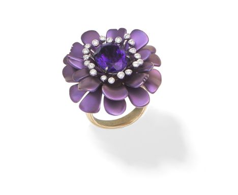 MARGHERITA BURGENER: AMETHYST AND DIAMOND FLOWER RINGDesigned as a flower with purple titanium petals, the central oval-cut a