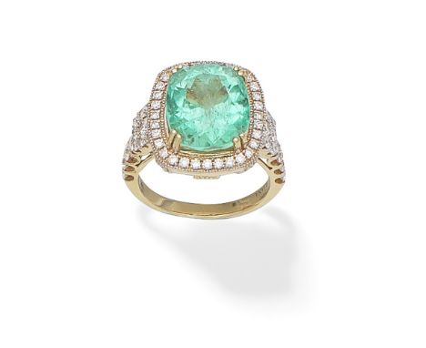 EMERALD AND DIAMOND CLUSTER RINGThe cushion-shaped emerald within a surround of brilliant-cut diamonds, between similarly-cut