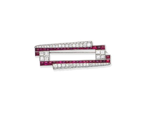 ART DECO RUBY AND DIAMOND BROOCH, CIRCA 1925Of geometric form, set with buff-top calibré-cut  rubies and step and old brillia