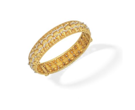 SEED PEARL-SET BANGLEThe hinged bangle of openwork design, set with seed pearls, inner circumference approx. 19.0cmFor furthe