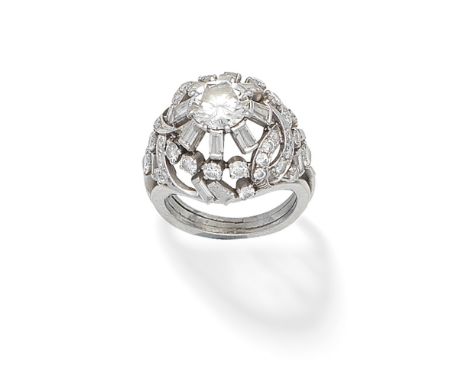 DIAMOND BOMBÉ RINGThe central brilliant-cut diamond in an openwork mount set with baguette and brilliant-cut diamonds,  princ