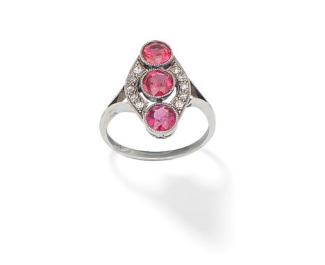 SPINEL AND DIAMOND PLAQUE RINGSet with three circular-cut pink spinels within an openwork surround set with single-cut diamon