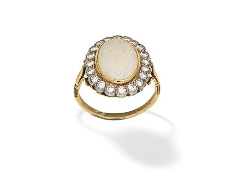 OPAL AND DIAMOND CLUSTER RINGThe oval opal cabochon within a surround of brilliant-cut diamonds,  ring size approx. PFor furt