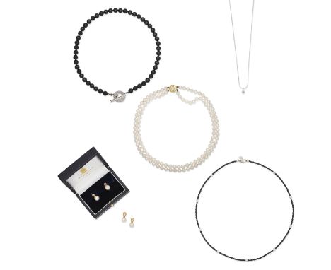 DIAMOND PENDANT/NECKLACE, CULTURED PEARL NECKLACE AND EARRINGS, AND TWO ONYX BEAD NECKLACES BY TIFFANY1st: The brilliant-cut 