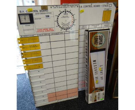 Two diving breathing apparatus control boards together with a light up message board