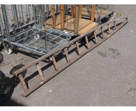 A vintage wooden window cleaner's ladder (outside)