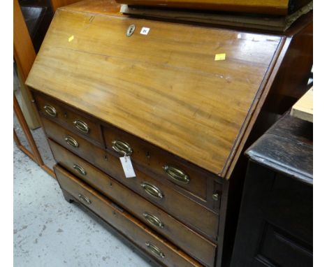 An antique light mahogany drop down bureau, two short & three long drawers with brass fittingscondition:I have inspected the 