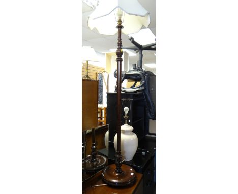 Two vintage dark wood standard lamps together with a large ceramic table lamp