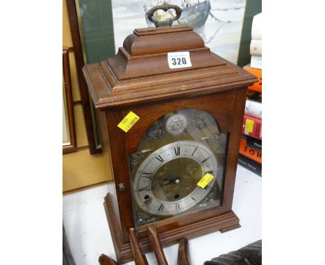 An Elliott Regency-style mahogany cased bracket clock with Westminster chime / strike mechanism