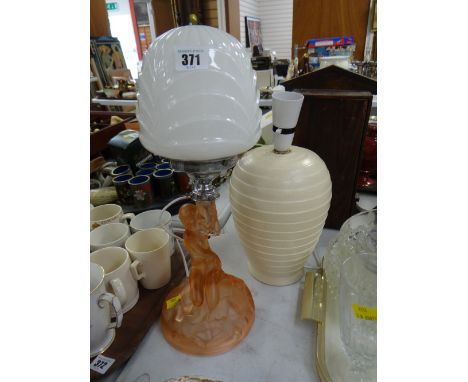 An Art Deco-style pink glass lamp together with another