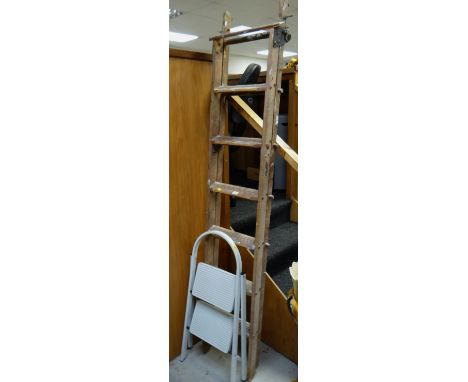A set of vintage tall wooden step ladders by Crossley & a modern small metal two-step ladder