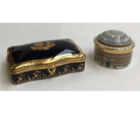 A Halcyon Days Royal Albert Hall music box; together with a Limoges Castel trinket box with 22ct gold gilt decoration 