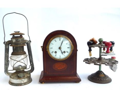 An Edwardian 8 day mantel clock, with marquetry and satinwood inlay; together with a vintage revolving stamp holder and tille