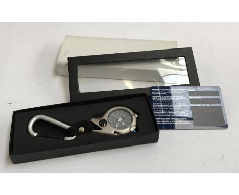 A Davis Micro Light clip watch, in silver, with presentation box and guarantee 