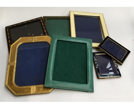 A mixture of quality photo frames, some leather and gilt, gilt metal, and hand painted enamel (7) 