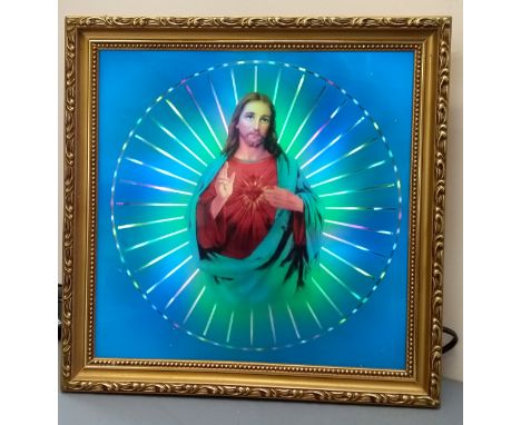 An illuminated spinning light box picture of The Sacred Heart of Jesus, approx. 33x33cm