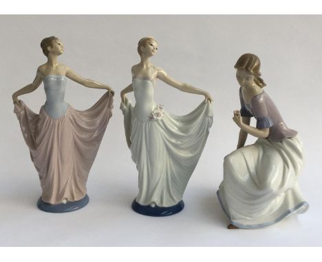 Two Lladro figures, each approx. 31cmH; together with one NAO figurine (3) 