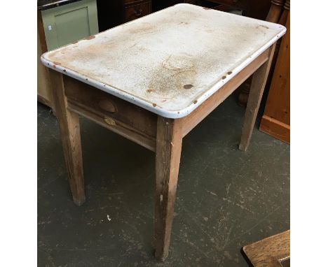 An early 20th century enamel topped  pine table, bears label, 'The Castell Table'. with single drawer, 101cmW 64cmD, 78cmH 