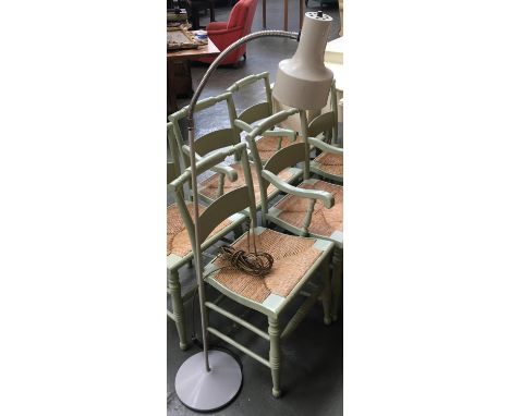 A floor standing poseable reading lamp 