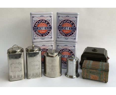 A mixed lot of tins to include four Moores Dorset Knob biscuit tins; and various metal kitchen canisters; small copper tea ca