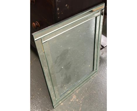 A modern wall mirror, 80x60cm; together with two bathroom light fittings 