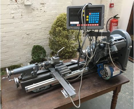 A Myford Super 7 metalworking lathe, with model DRO II-2L Sinpo control panel; together with a vast quantity of accessories a