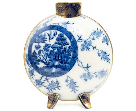 Pinder Bourne & Co vase of oriental moon flask form designed by Henry Slater, decorated in underglaze blue with a cluster of 