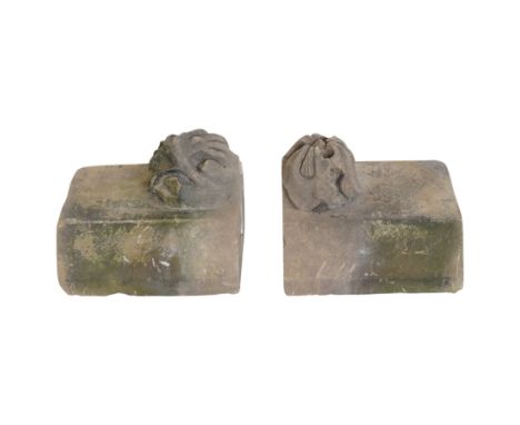Pair of 19th-century classical style carved stone architectural fragments of rectangular form with a raised floral rosette mo