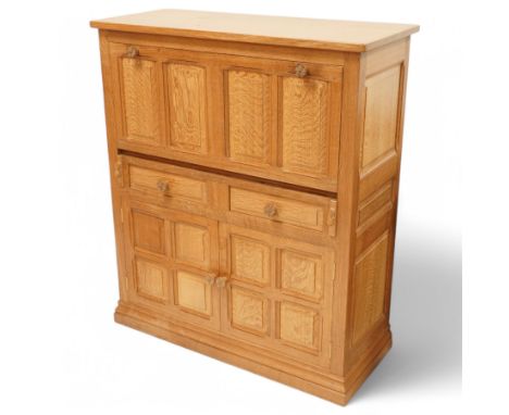 Beaverman - oak panelled drinks or side cabinet, rectangular top over four panel fall front with Yorkshire rose carved handle