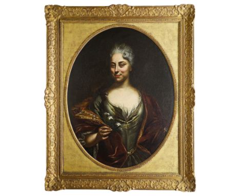 Austrian School (Early 18th century): Portrait of a Noblewoman wearing an Elaborate Silk Gown and Shawl holding Flowers, oil 