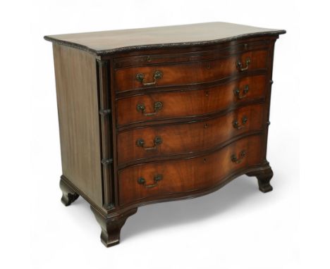 Georgian design mahogany serpentine chest, with rectangular top with floral rosette carved edge, cluster reeded columns with 