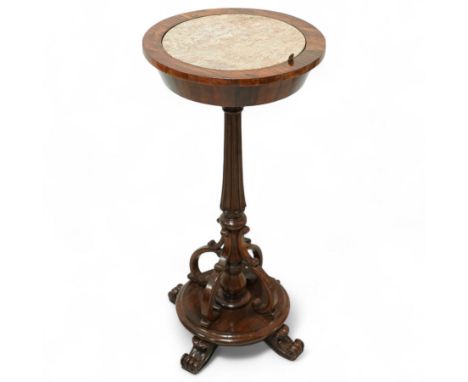 An early Victorian rosewood plant stand with removable marble top, with metal interior liner, circular top above fluted colum