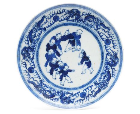 Late 19th century Chinese blue and white plate, the central panel decorated with '100 boys pattern, within a border of dragon