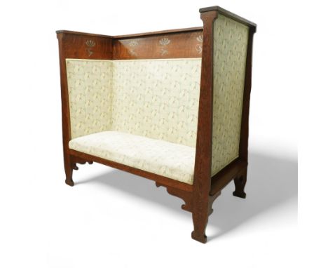James Shoolbred & Co. (1814-1934) - Arts & Crafts high-back oak settle or hall-bench, the projecting cresting rail over a fri