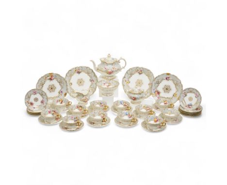 Early 20th century Coalport tea service, retailed by Waring & Gillow decorated with a gilt centre, the pale blue border paint