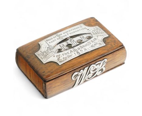 Scottish oak snuff box, of rectangular form, the hinged cover with pierced and engraved white metal plaque, inscribed 'Made o
