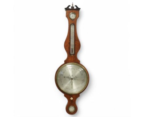 Zanetti of Manchester- late 19th century wheel barometer in a mahogany case with a break arch pediment, brass finial and roun