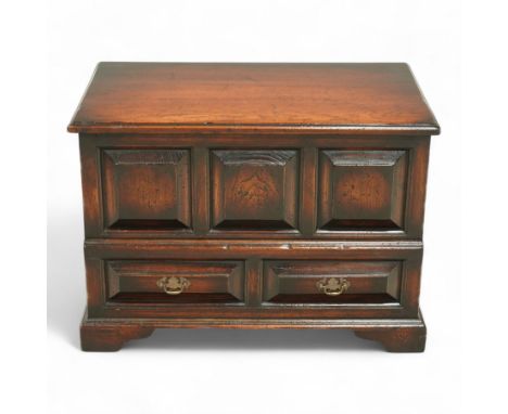 Titchmarsh and Goodwin design miniature oak coffer, rectangular, removable top with projecting panelled front with blind draw