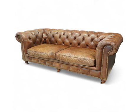 Timothy Oulton, Halo - Late 20th century brown leather Chesterfield settee, the upholstered frame with deep buttoning to back