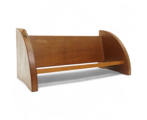 Mouseman - oak book trough, curved end supports carved with mouse signature, by the workshop of Robert Thompson, Kilburn W45c
