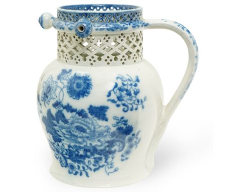 Swansea Cambrian pottery pearlware puzzle jug, c.1810, decorated in underglaze blue with peonies and sprigs of flowers, the s