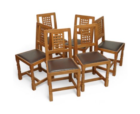 Mouseman - set of six oak dining chairs, pierced and carved lattice back over leather upholstered seat, on octagonal front su
